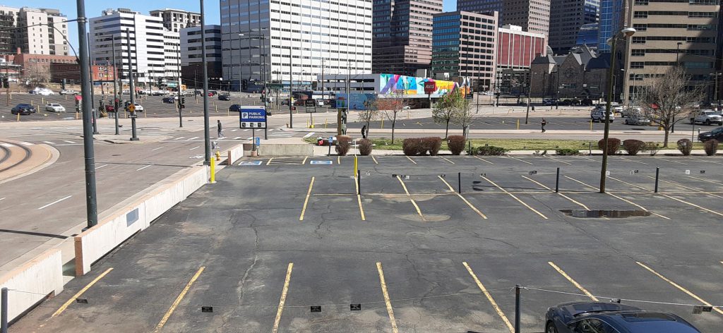 Several empty parking lots in the downtown area.