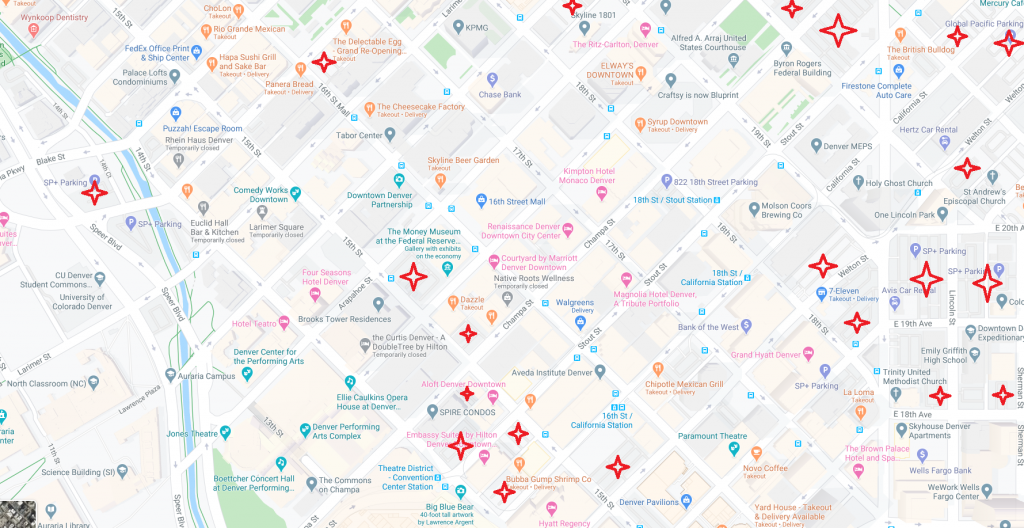 A map of Denver downtown with open-air parking lots marked by red stars